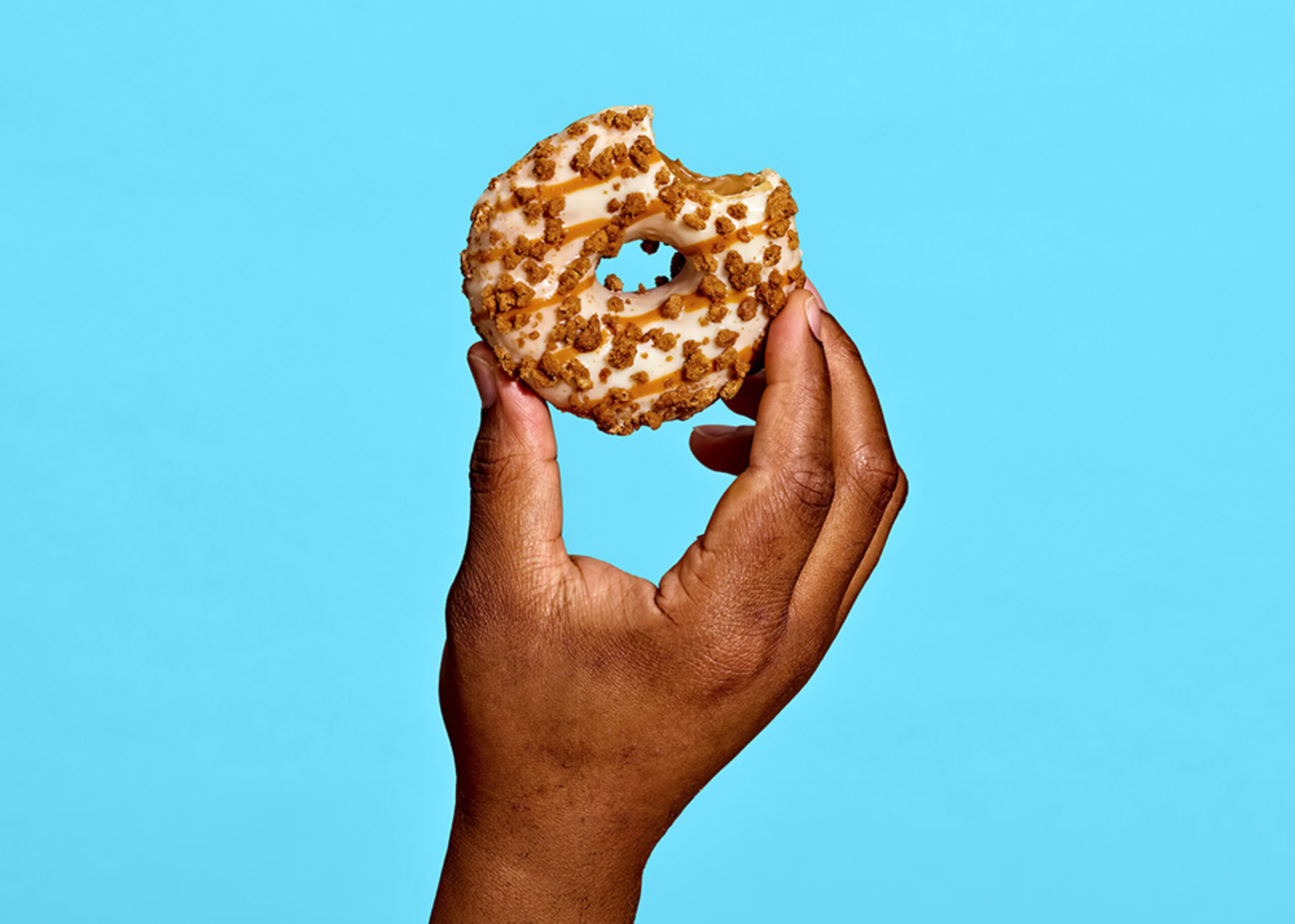 228289 Schulstad Cookie Butter Filled Ring Donut with Bite