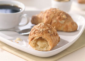 22331000 Schulstad Mini Almond Filled Croissant with coffee