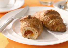22331000 Schulstad Mini Apricot Filled Croissants on plate