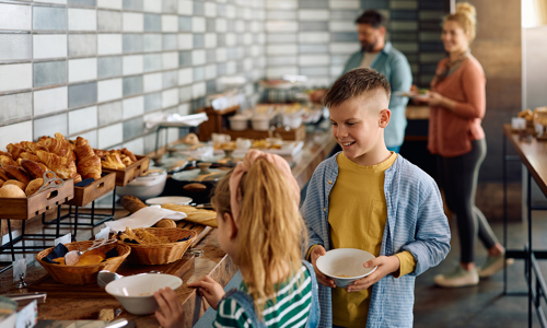 happy-boy-and-girl-enjoying-in-buffet-breakfast-at-2026-01-06-10-27-19-utc.jpg