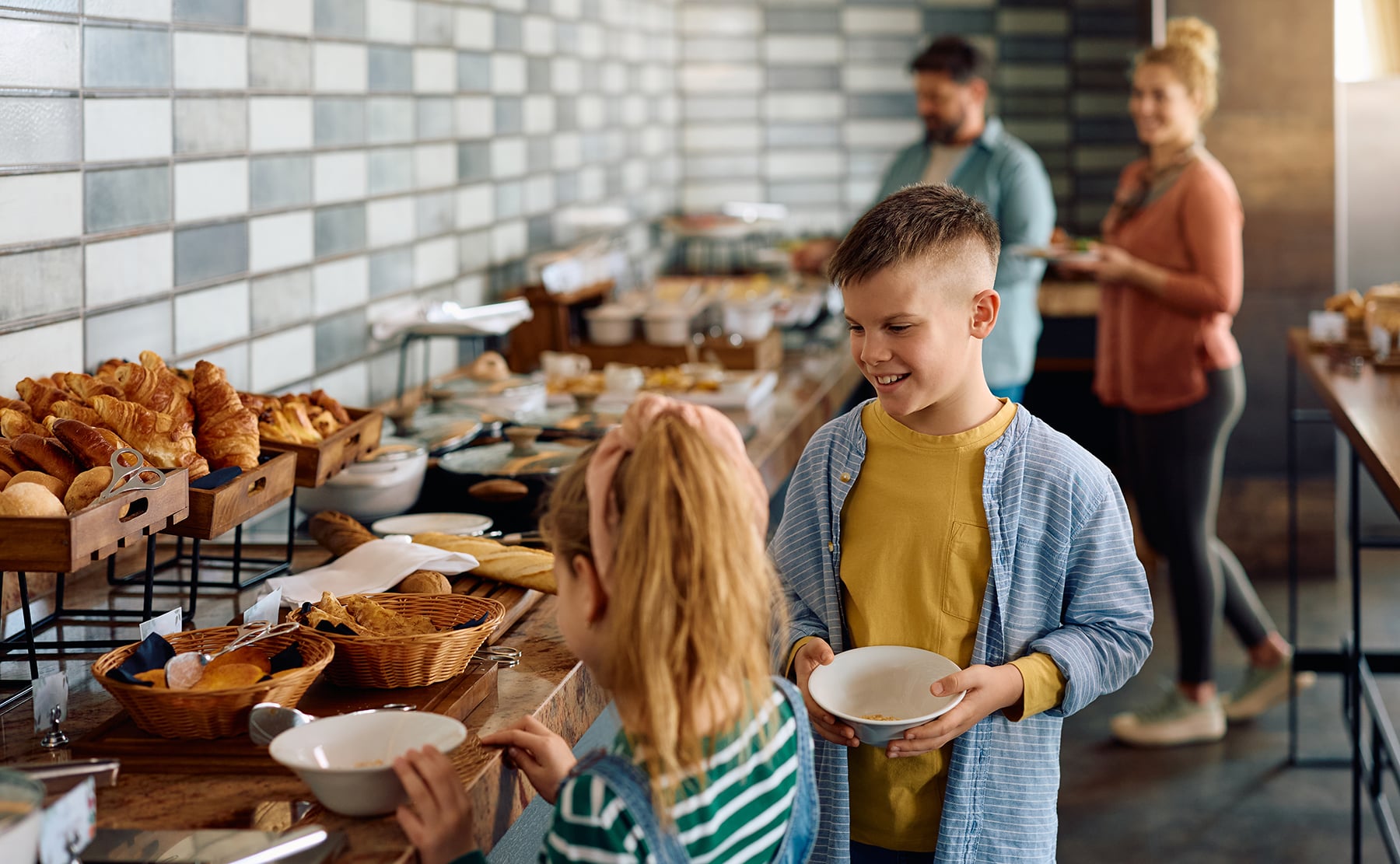 happy-boy-and-girl-enjoying-in-buffet-breakfast-at-2026-01-06-10-27-19-utc.jpg